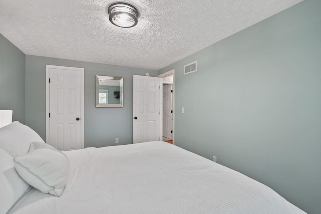 712 Suntree Dr, Westerville, OH 43081 - bedroom with a textured ceiling