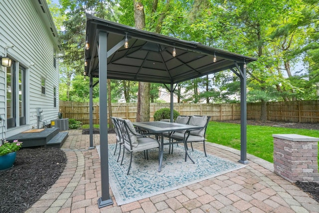 712 Suntree Dr, Westerville, OH 43081 - fenced backyard with a gazebo, outdoor dining space, and a patio