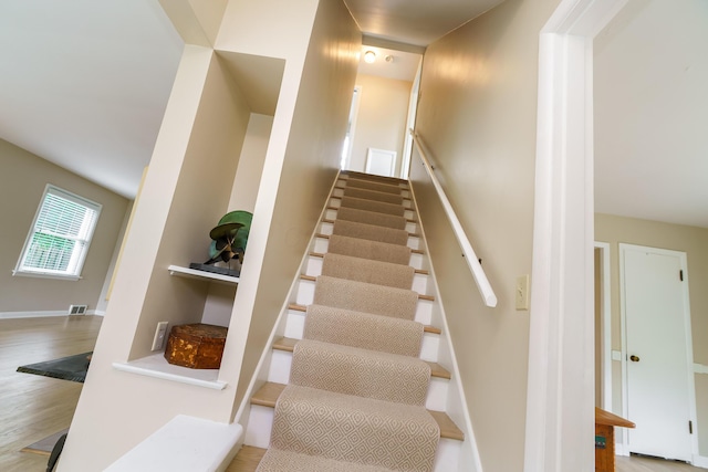 2006 Kentwell Rd, Upper Arlington, OH 43221 - stairway featuring wood finished floors and baseboards