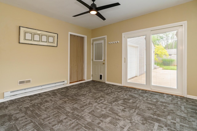 2006 Kentwell Rd, Upper Arlington, OH 43221 - empty room featuring a baseboard heating unit, dark carpet, and a ceiling fan