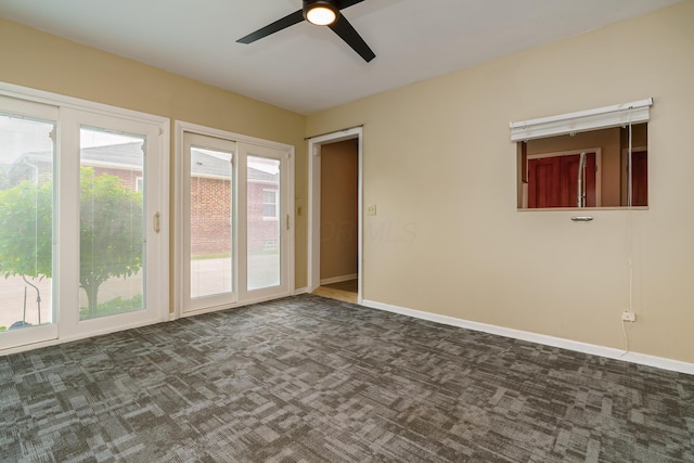 2006 Kentwell Rd, Upper Arlington, OH 43221 - empty room with dark carpet and a ceiling fan