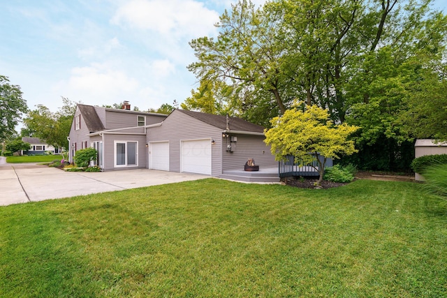 2006 Kentwell Rd, Upper Arlington, OH 43221 - view of front of property featuring an attached garage, driveway, a chimney, a front yard, and a deck