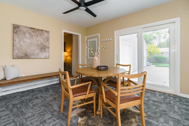 2006 Kentwell Rd, Upper Arlington, OH 43221 - dining area featuring carpet, a ceiling fan, and a baseboard heating unit