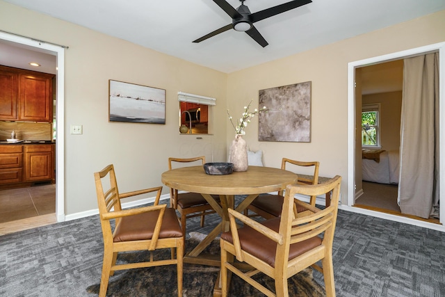 2006 Kentwell Rd, Upper Arlington, OH 43221 - dining room featuring ceiling fan and dark carpet