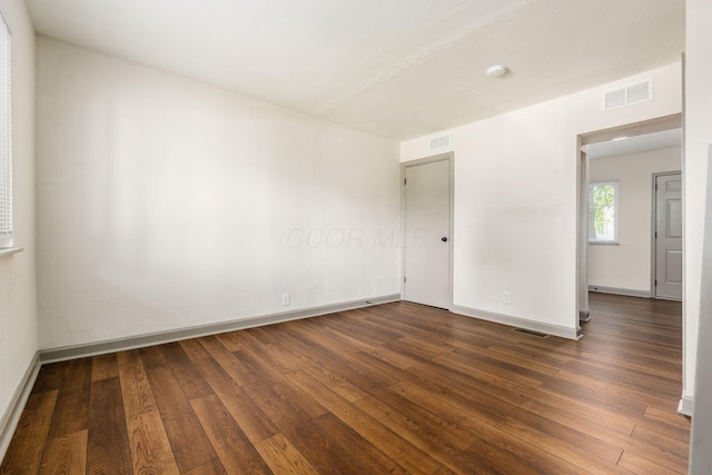 437-441 S Glenwood Ave, Columbus, OH 43223 - unfurnished room with dark wood-style floors and a smoke detector