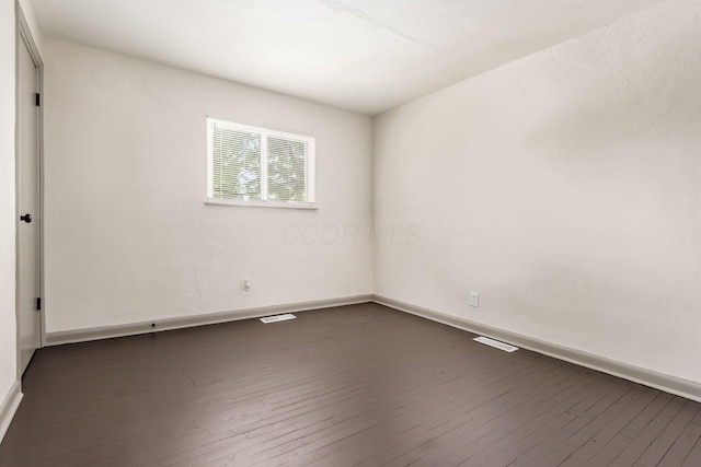 437-441 S Glenwood Ave, Columbus, OH 43223 - spare room featuring dark wood finished floors and baseboards