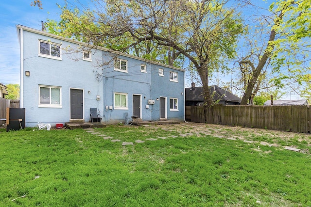 437-441 S Glenwood Ave, Columbus, OH 43223 - rear view of property featuring stucco siding and entry steps