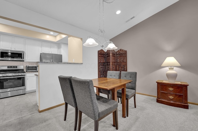 595 Piney Glen Dr, Columbus, OH 43230 - dining area with lofted ceiling, recessed lighting, and light colored carpet