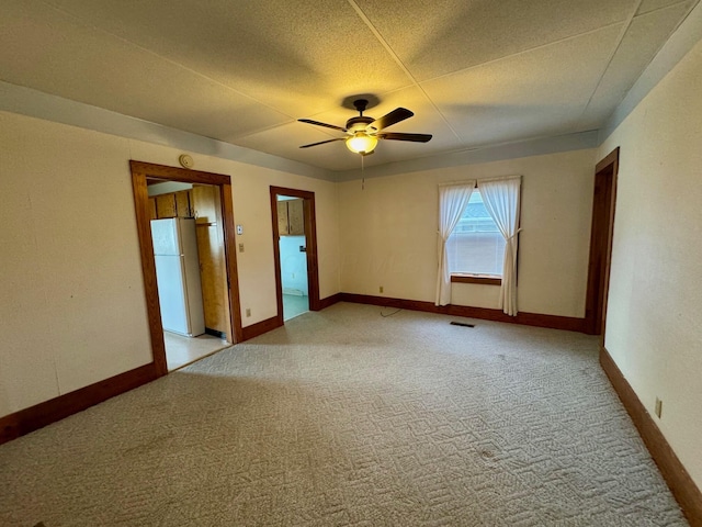 181 W 3rd St, Frazeysburg, OH 43822 - unfurnished room featuring light carpet and ceiling fan