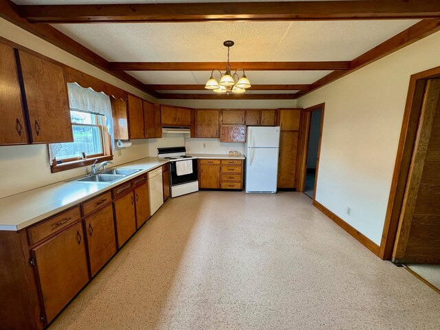 181 W 3rd St, Frazeysburg, OH 43822 - kitchen with white appliances, beamed ceiling, brown cabinets, a chandelier, and light countertops
