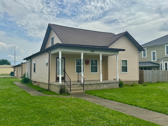 181 W 3rd St, Frazeysburg, OH 43822 - view of front of house featuring covered porch and a shingled roof
