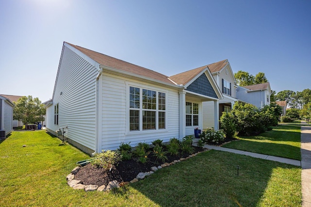 5654 Caledonia Dr, Westerville, OH 43081 - view of side of home featuring a lawn
