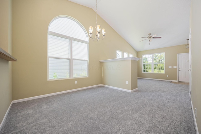 5654 Caledonia Dr, Westerville, OH 43081 - carpeted empty room featuring lofted ceiling, ceiling fan, and a chandelier