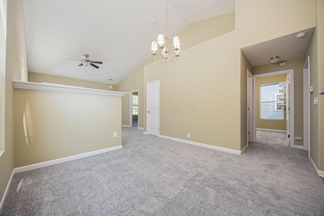 5654 Caledonia Dr, Westerville, OH 43081 - carpeted spare room featuring healthy amount of natural light, high vaulted ceiling, a ceiling fan, and a chandelier