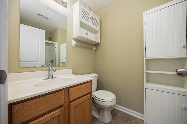 5654 Caledonia Dr, Westerville, OH 43081 - bathroom with tile patterned flooring, vanity, and a shower with shower door