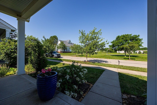 5654 Caledonia Dr, Westerville, OH 43081 - view of green lawn with a porch