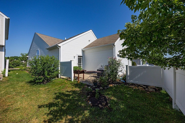 5654 Caledonia Dr, Westerville, OH 43081 - back of house with roof with shingles and an attached garage