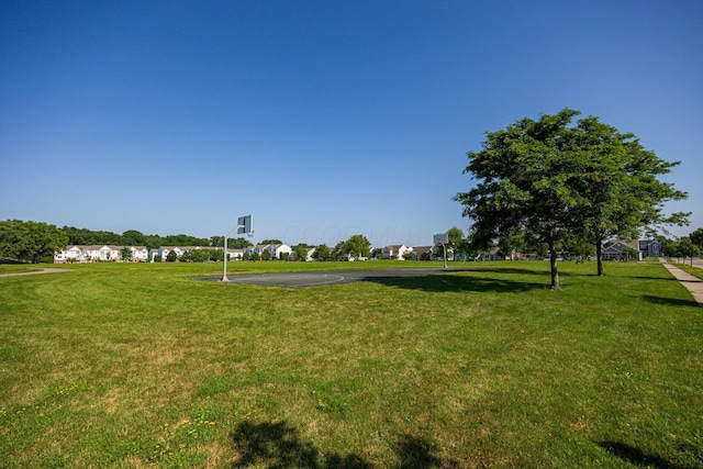 5654 Caledonia Dr, Westerville, OH 43081 - view of community featuring a yard and community basketball court