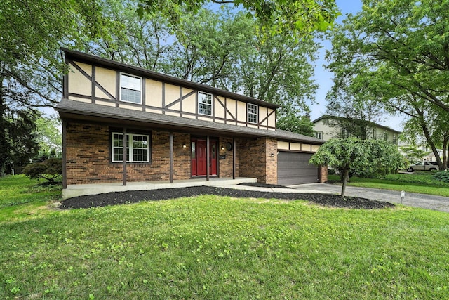 1360 Langston Dr, Columbus, OH 43220 - tudor home with driveway, stucco siding, and a front yard