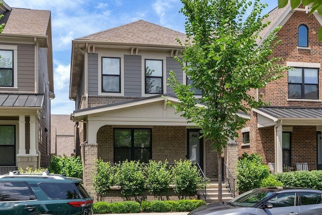 954 Hudson Xing, Columbus, OH 43212 - view of front of house with brick siding and a porch