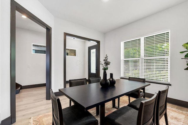 954 Hudson Xing, Columbus, OH 43212 - dining room with light wood-style flooring and baseboards