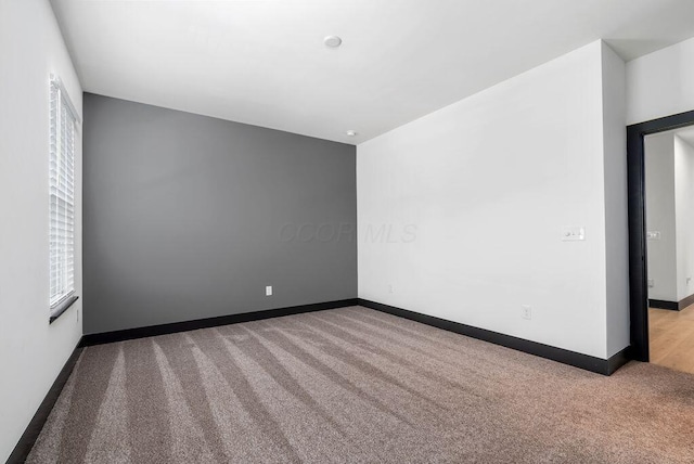 954 Hudson Xing, Columbus, OH 43212 - carpeted empty room featuring baseboards