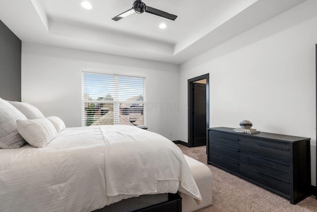 954 Hudson Xing, Columbus, OH 43212 - bedroom with light carpet, a raised ceiling, ceiling fan, and recessed lighting