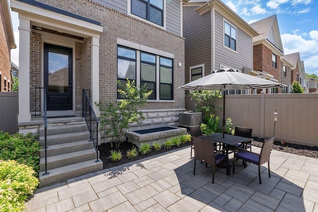 954 Hudson Xing, Columbus, OH 43212 - view of patio with outdoor dining space, a residential view, and entry steps