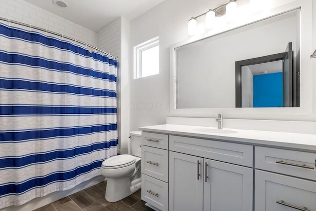 954 Hudson Xing, Columbus, OH 43212 - bathroom featuring vanity, wood finished floors, and a shower with shower curtain