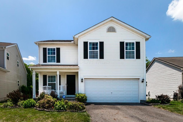 929 Preble Dr, Blacklick, OH 43004 - traditional-style house with a porch, a garage, and asphalt driveway
