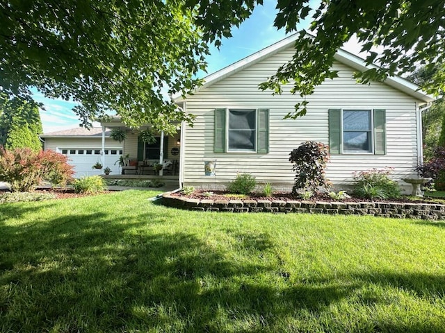 215 Barb Ct, Heath, OH 43056 - back of house featuring a garage and a yard