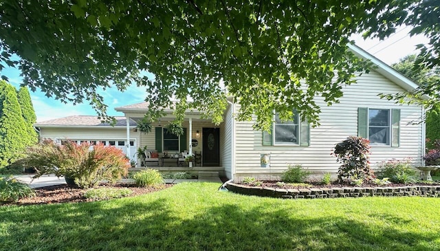 215 Barb Ct, Heath, OH 43056 - view of front of property featuring covered porch, a front yard, and an attached garage