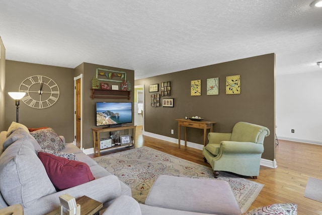 215 Barb Ct, Heath, OH 43056 - living room featuring wood finished floors and a textured ceiling