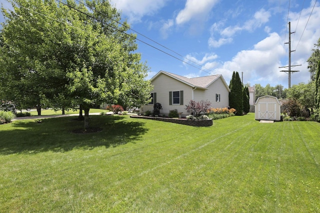215 Barb Ct, Heath, OH 43056 - view of green lawn featuring a shed