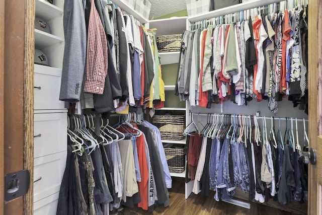 215 Barb Ct, Heath, OH 43056 - walk in closet featuring wood finished floors