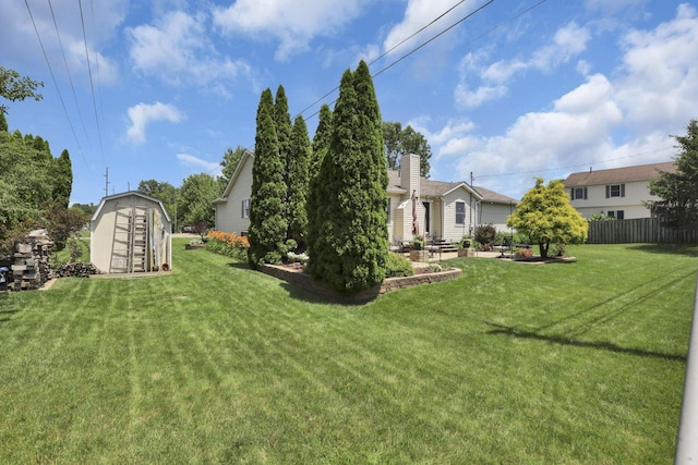 215 Barb Ct, Heath, OH 43056 - view of yard with a storage unit and a patio