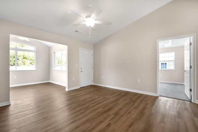 752 Whitetail Lp, Newark, OH 43055 - empty room featuring lofted ceiling, ceiling fan, and dark wood-style flooring
