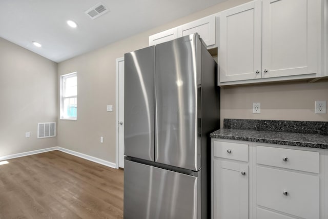 752 Whitetail Lp, Newark, OH 43055 - kitchen featuring freestanding refrigerator, wood finished floors, white cabinetry, dark stone counters, and recessed lighting