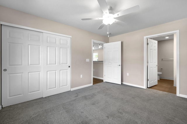 752 Whitetail Lp, Newark, OH 43055 - unfurnished bedroom featuring carpet flooring, a closet, connected bathroom, and a ceiling fan