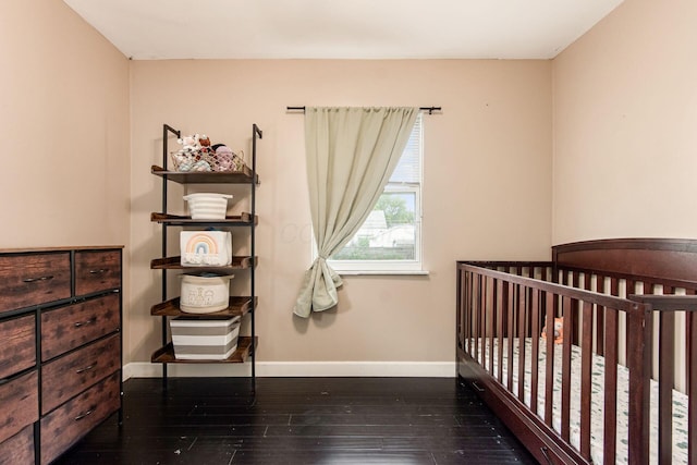 794 E Brighton Rd, Columbus, OH 43224 - bedroom featuring wood-type flooring and baseboards