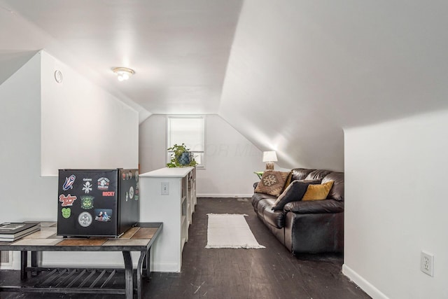794 E Brighton Rd, Columbus, OH 43224 - living room featuring vaulted ceiling and dark wood finished floors