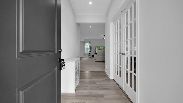 336 Onyx Ln, Delaware, OH 43015 - hallway with light wood finished floors, recessed lighting, and french doors