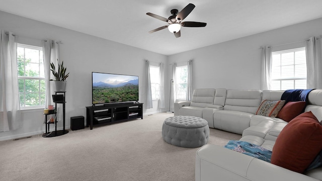 336 Onyx Ln, Delaware, OH 43015 - carpeted living room with ceiling fan and baseboards