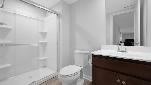 336 Onyx Ln, Delaware, OH 43015 - full bathroom with a shower stall, vanity, and wood finished floors