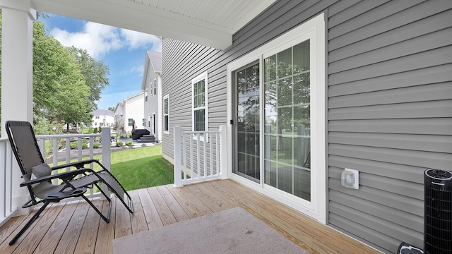 336 Onyx Ln, Delaware, OH 43015 - wooden porch with a lawn