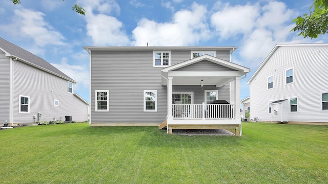 336 Onyx Ln, Delaware, OH 43015 - back of property featuring a lawn and covered porch