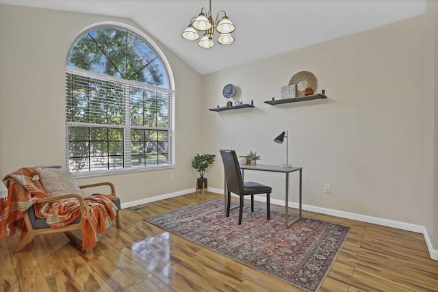 2375 Oakthorpe Dr, Hilliard, OH 43026 - office featuring healthy amount of natural light, a chandelier, wood finished floors, and vaulted ceiling