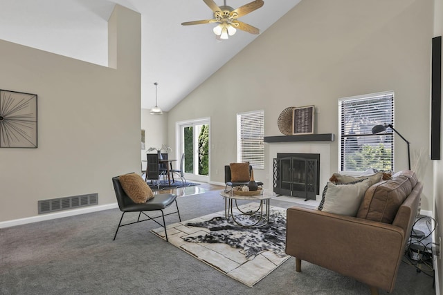 2375 Oakthorpe Dr, Hilliard, OH 43026 - carpeted living room with high vaulted ceiling, a ceiling fan, and a fireplace