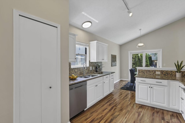 2375 Oakthorpe Dr, Hilliard, OH 43026 - kitchen featuring stainless steel dishwasher, backsplash, lofted ceiling, white cabinets, and dark wood-style flooring