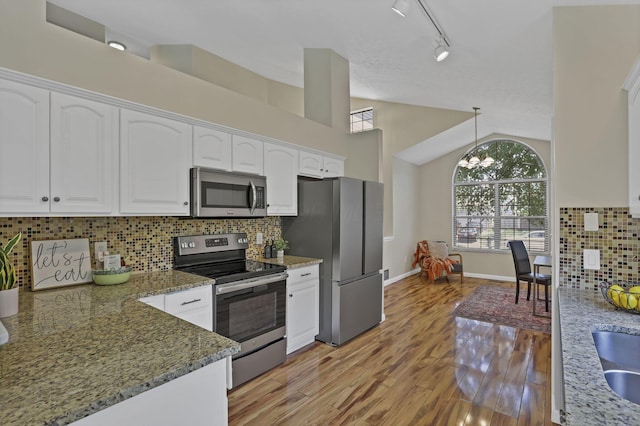 2375 Oakthorpe Dr, Hilliard, OH 43026 - kitchen with appliances with stainless steel finishes, white cabinets, light wood-type flooring, light stone counters, and track lighting